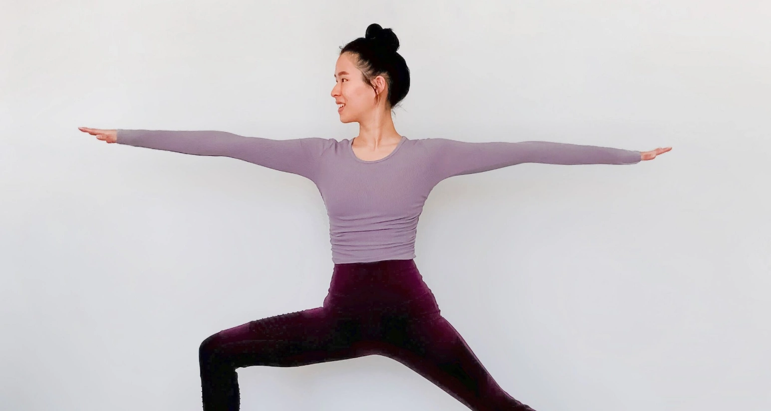 girl doing Warrior II Pose-Virabhadrasana II